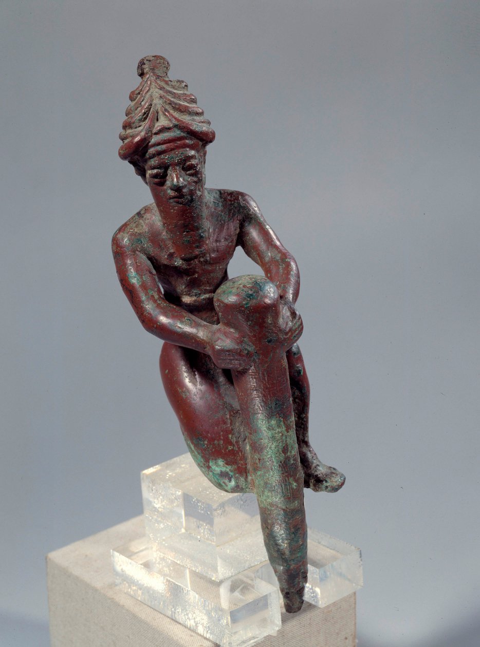 Mesopotamië: koperen funderingsfiguur die de god toont die een spijker duwt door Mesopotamian Mesopotamian