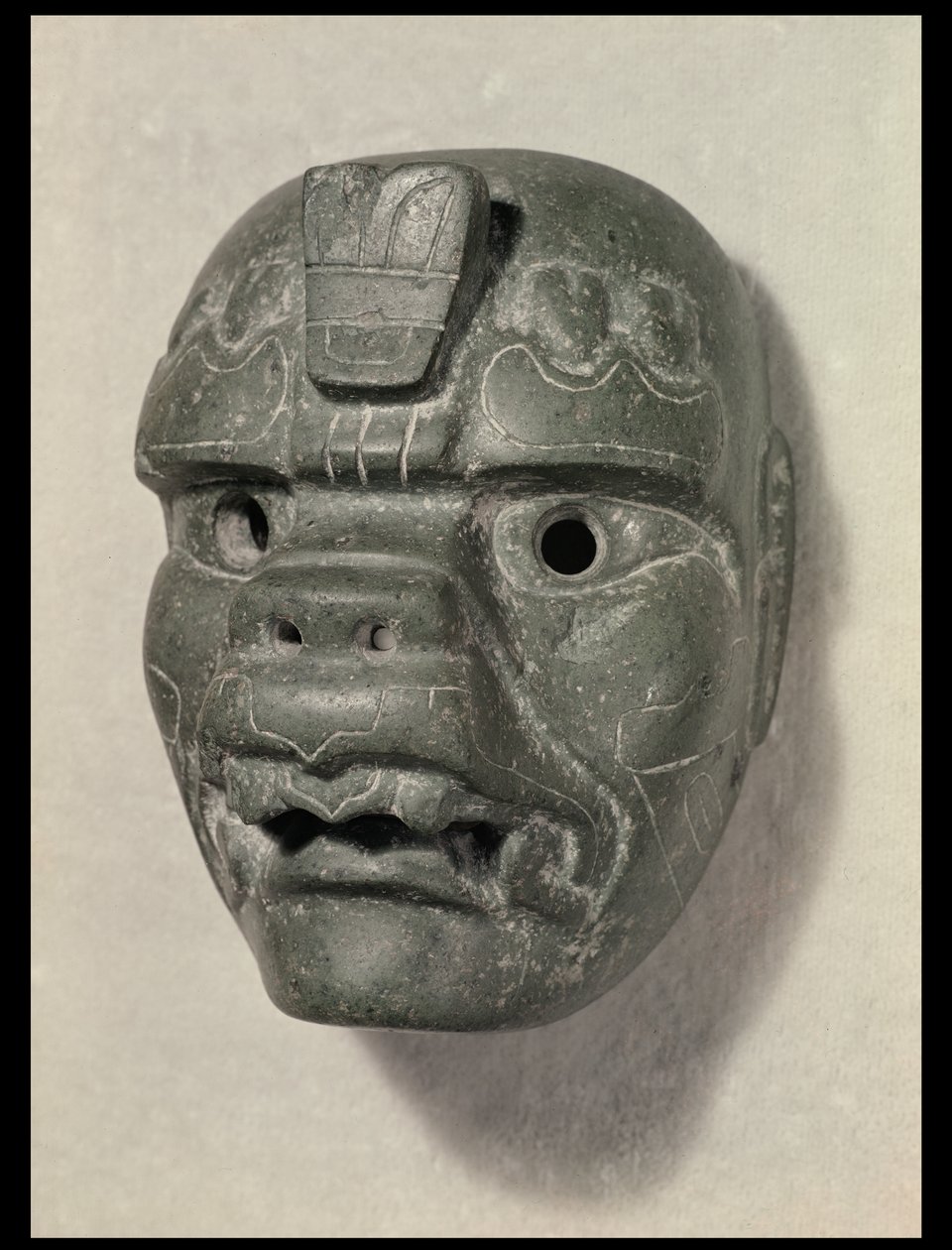 Feline masker van een man, uit Oaxaca, Pre-Columbiaans door Mexican School