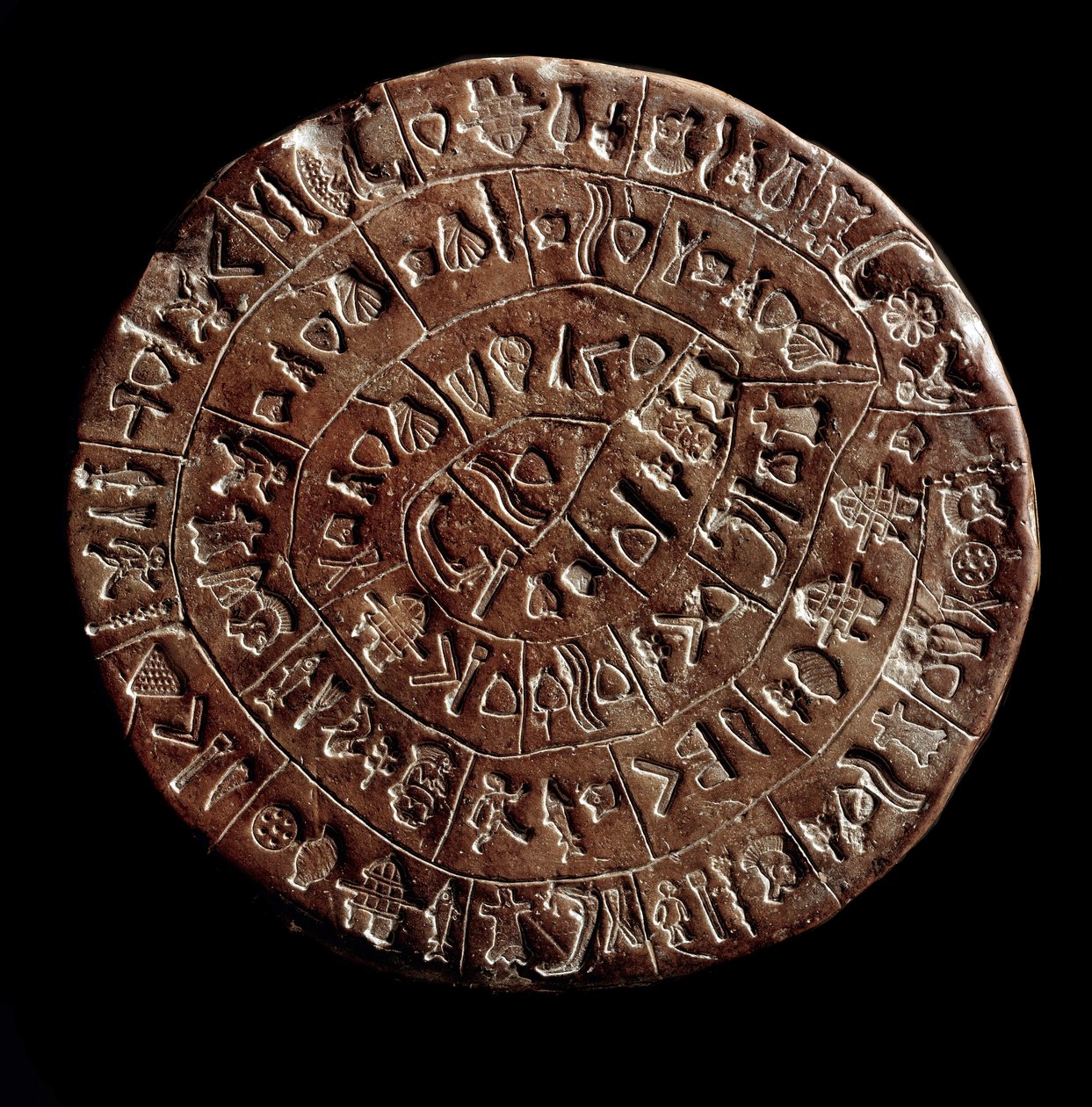 De schijf van Phaistos (Minoïsche kunst - 1700 - 1600 v.Chr.) bedekt met hiërogliefen door Minoan