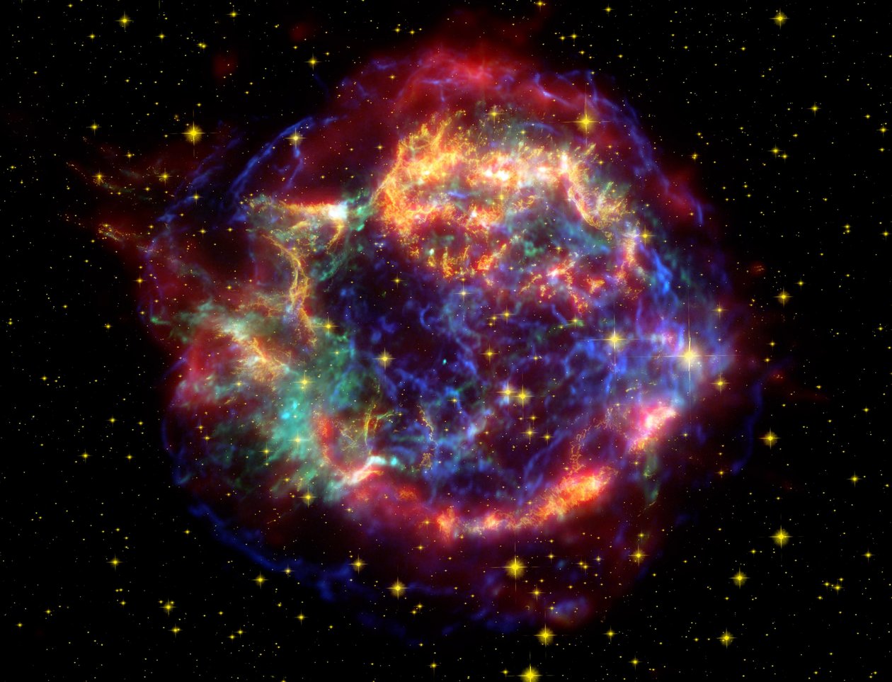 Valse-kleur beeld van supernova restant Cassiopeia A in het sterrenbeeld Cassiopeia, 10.000 lichtjaar verwijderd. Het is het restant van een eens massieve ster die stierf in een supernova-explosie. door National Aeronautics and Space Administration National Aeronautics and Space Administration