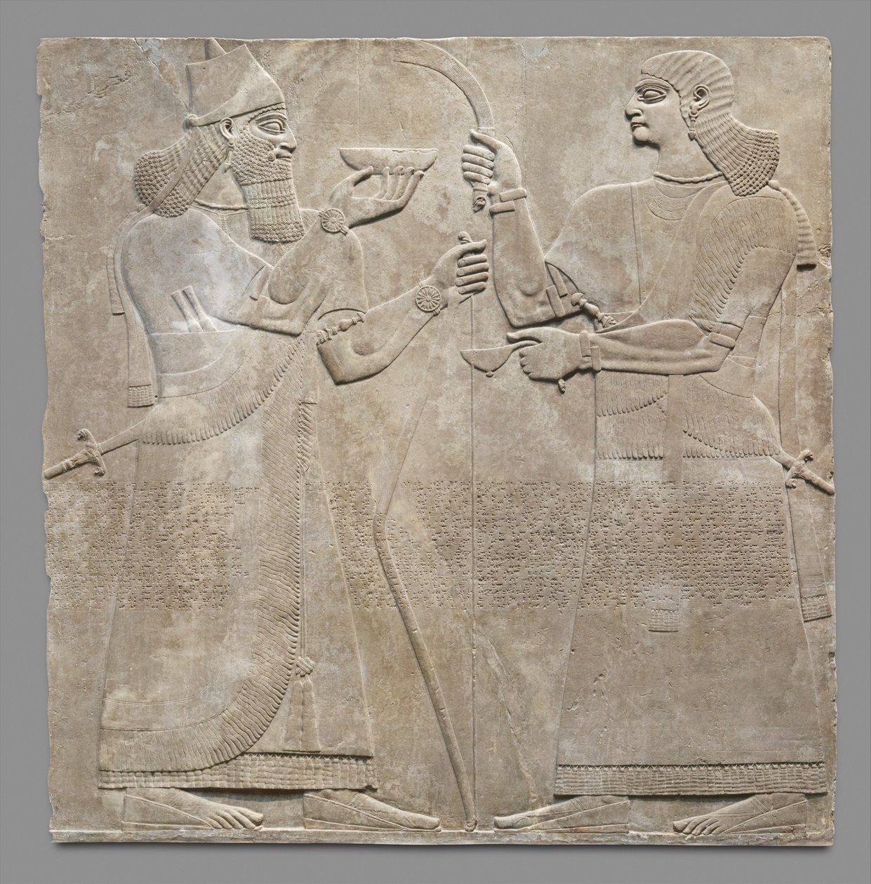 Reliëfpaneel van koning en eunuch, ca. 883-59 v.Chr. door Neo Assyrian