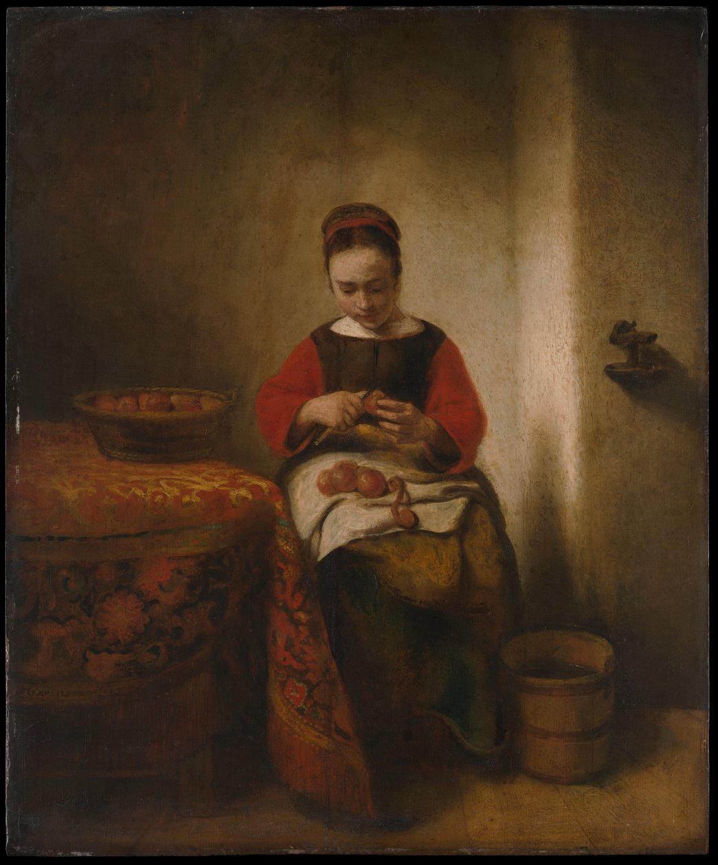 Jonge vrouw die appels schilt door Nicolaes Maes