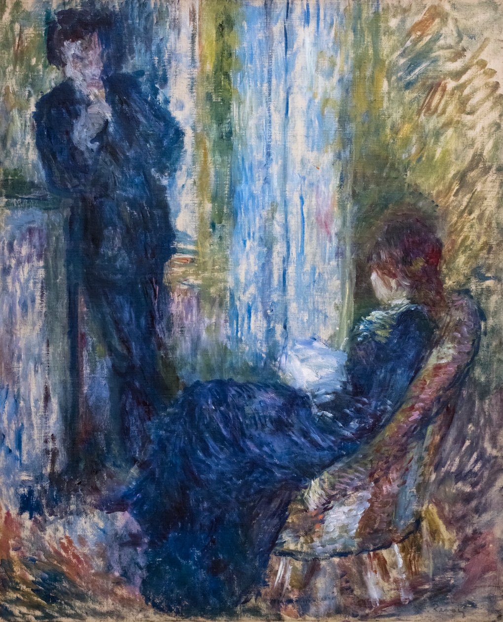 Bij de open haard door Pierre Auguste Renoir