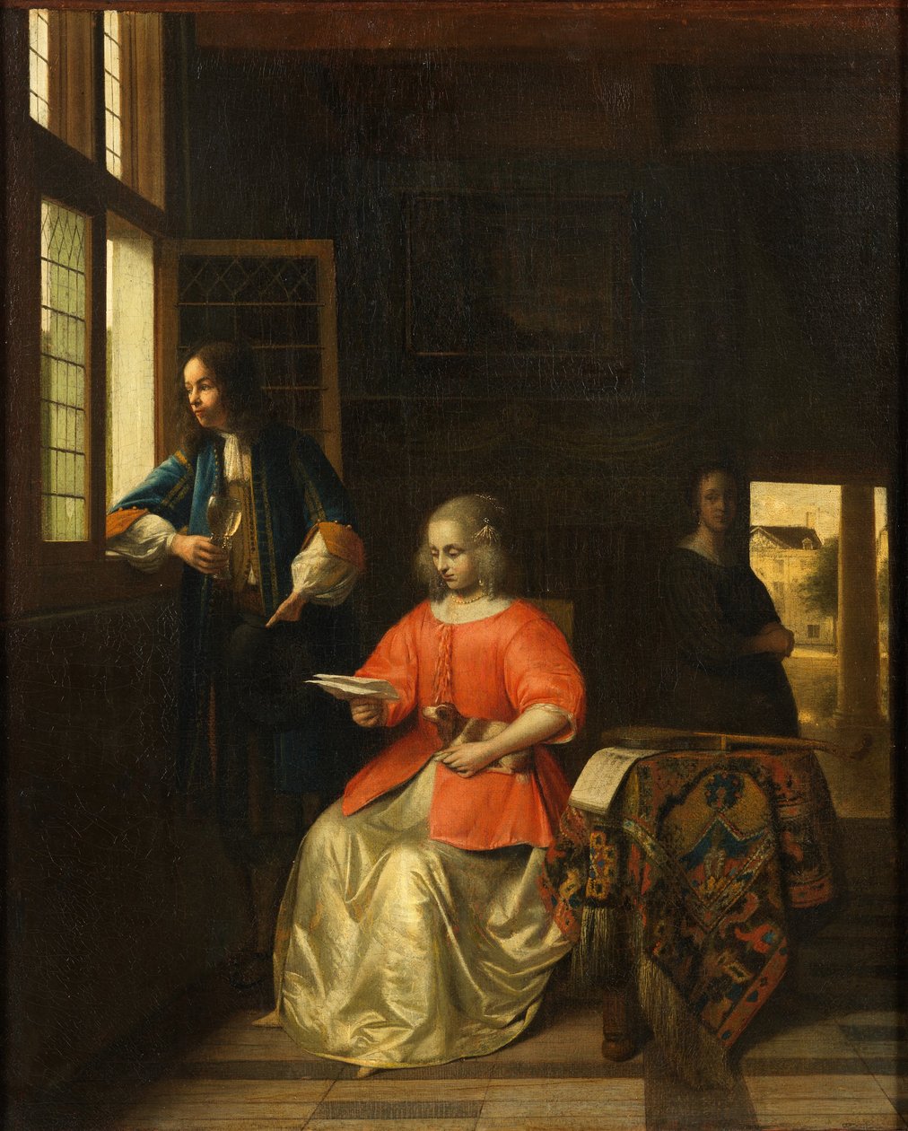 Interieur met een jonge vrouw die een brief leest door Pieter de Hooch