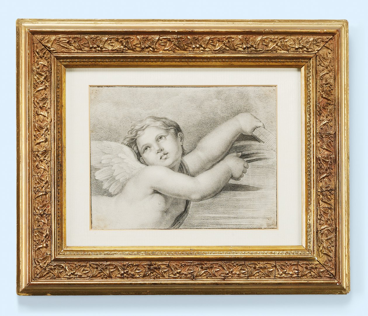 Hoofd van een putto door after Raphael