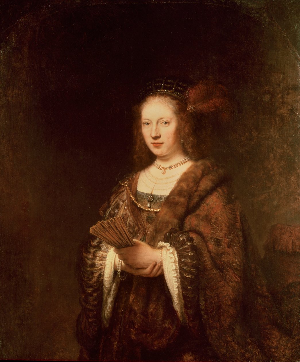 Dame met een waaier door Rembrandt van Rijn