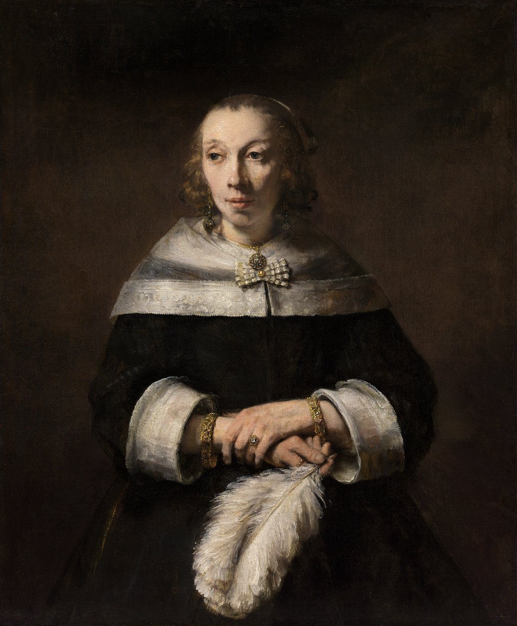 Portret van een Dame met een Struisvogelveren Waaier door Rembrandt van Rijn