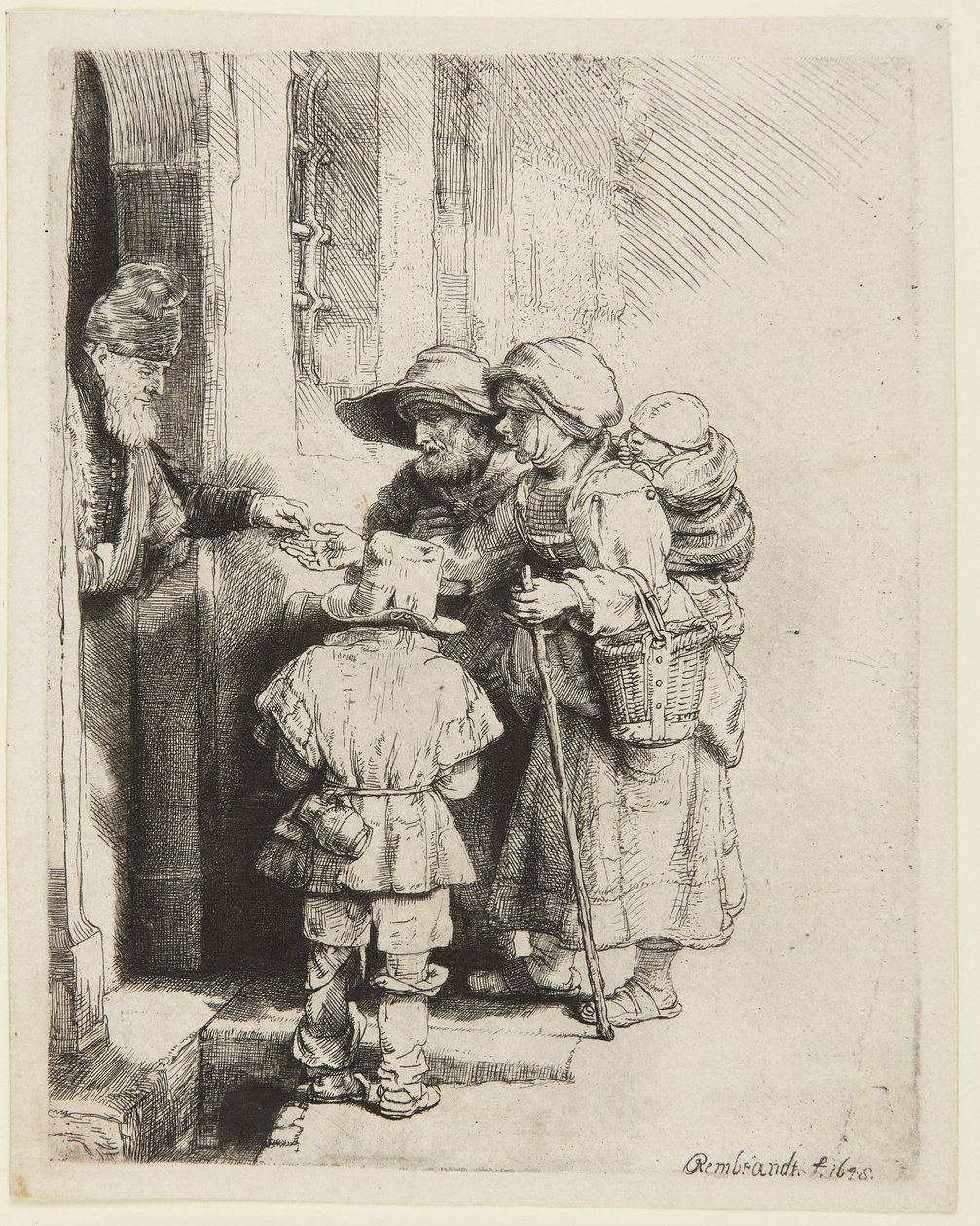 Een blinde draailierspeler en zijn gezin die aalmoezen ontvangen door Rembrandt van Rijn