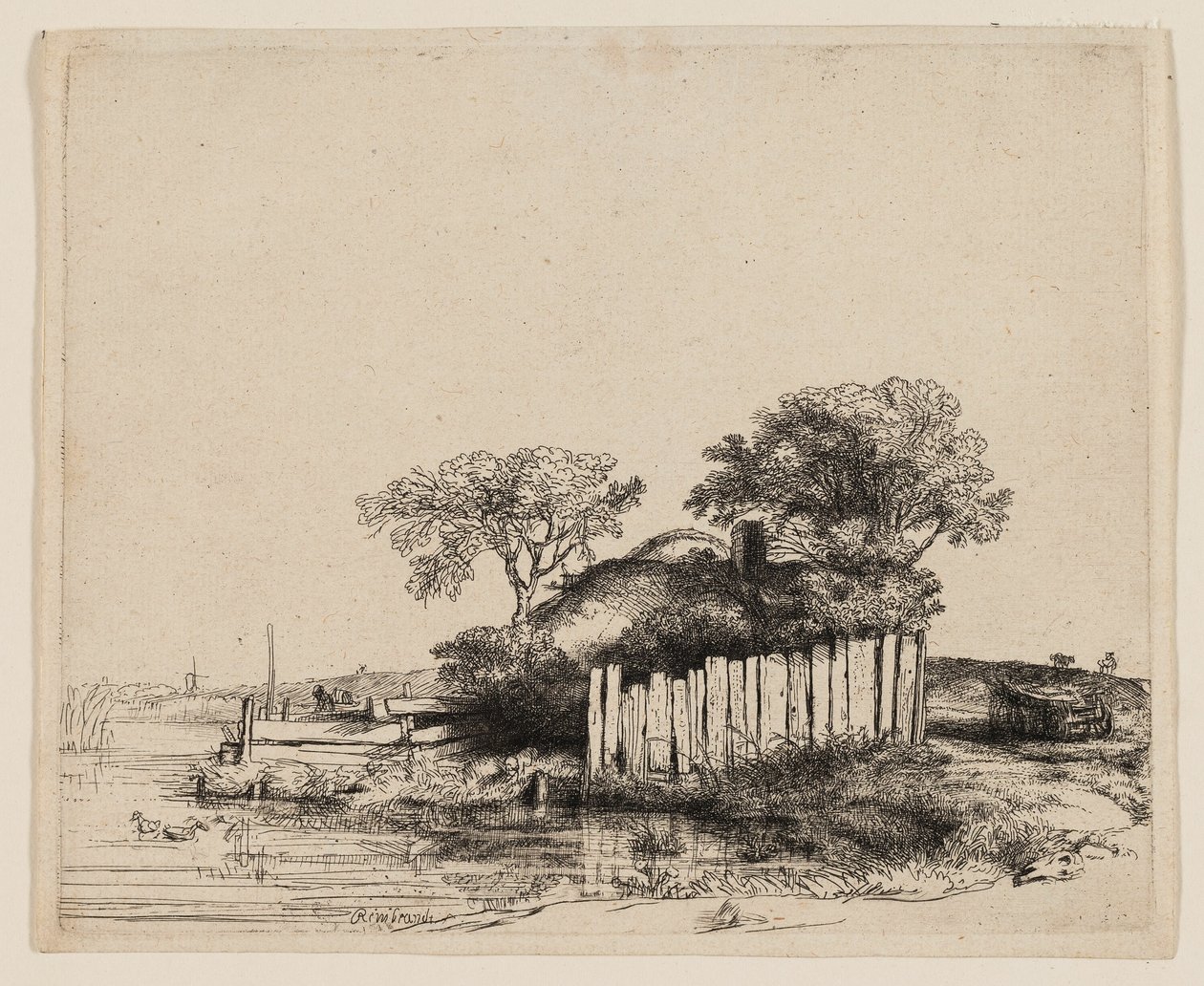 Een Cottage met Witte Omheining door Rembrandt van Rijn