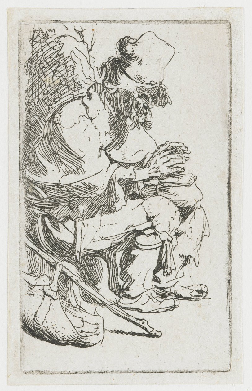 Een bedelaar die zijn handen warmt door Rembrandt van Rijn