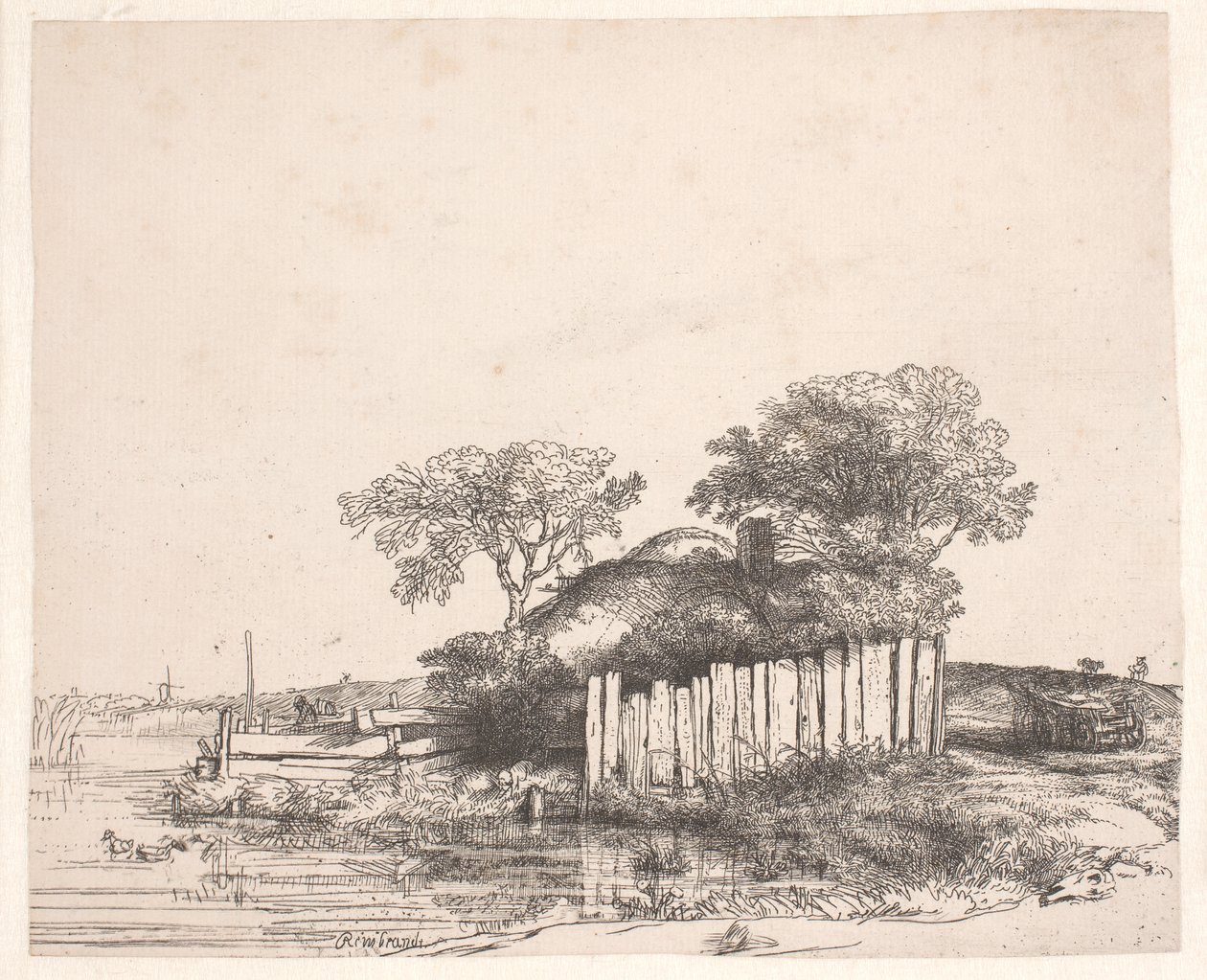 Huisje met een wit hekwerk door Rembrandt van Rijn