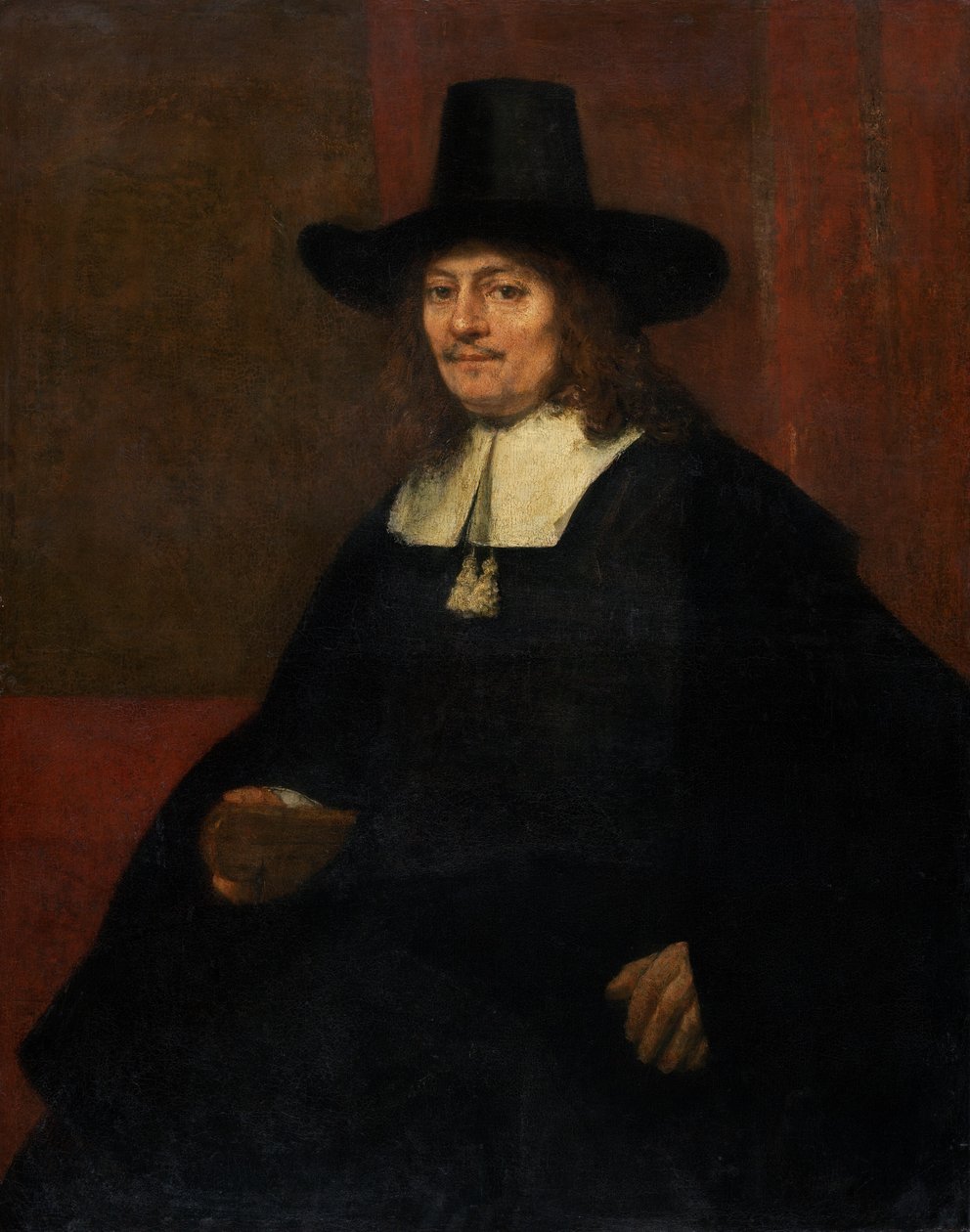 Portret van een man met een hoge hoed door Rembrandt van Rijn