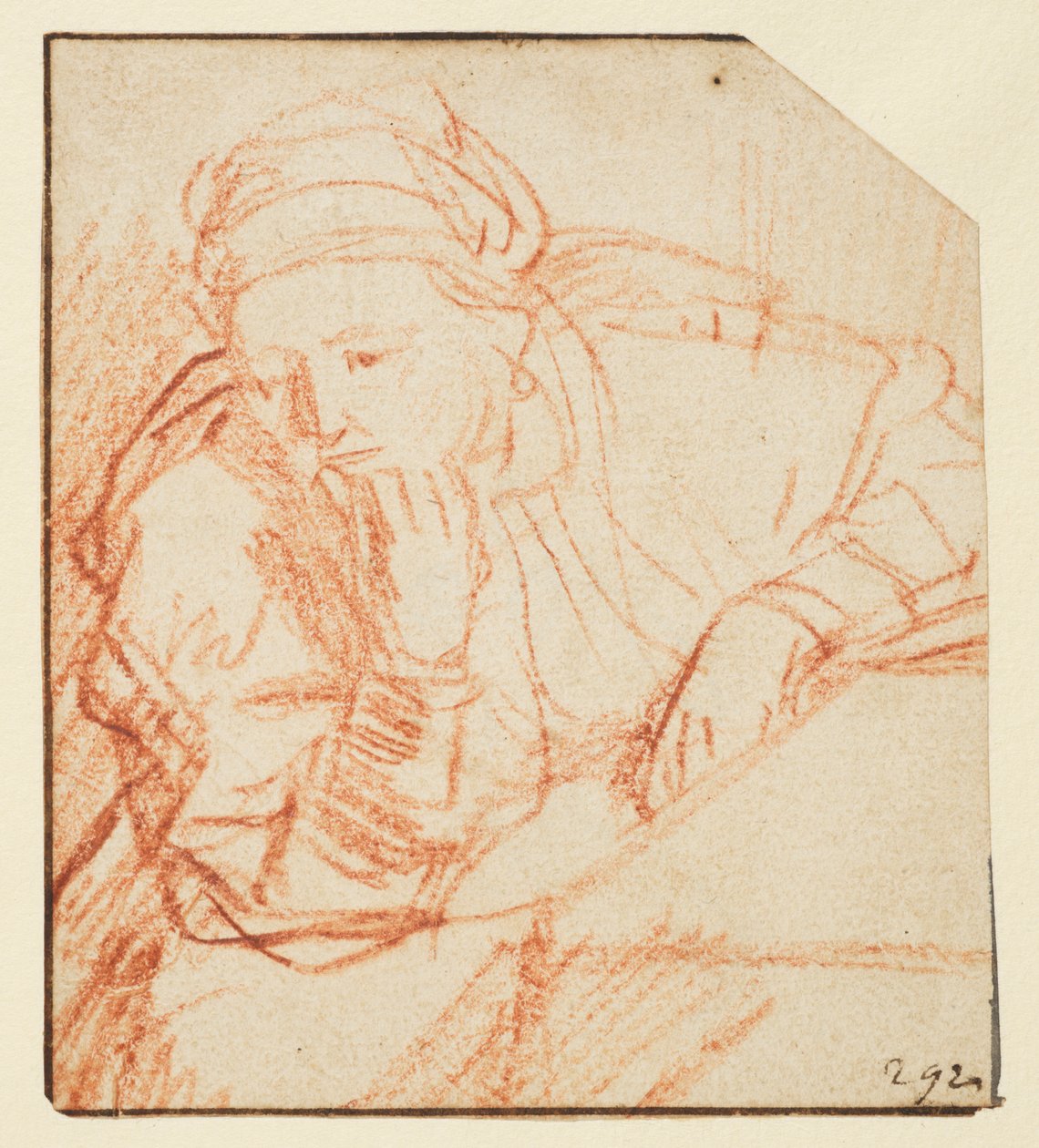 Saskia zittend aan een tafel door Rembrandt van Rijn