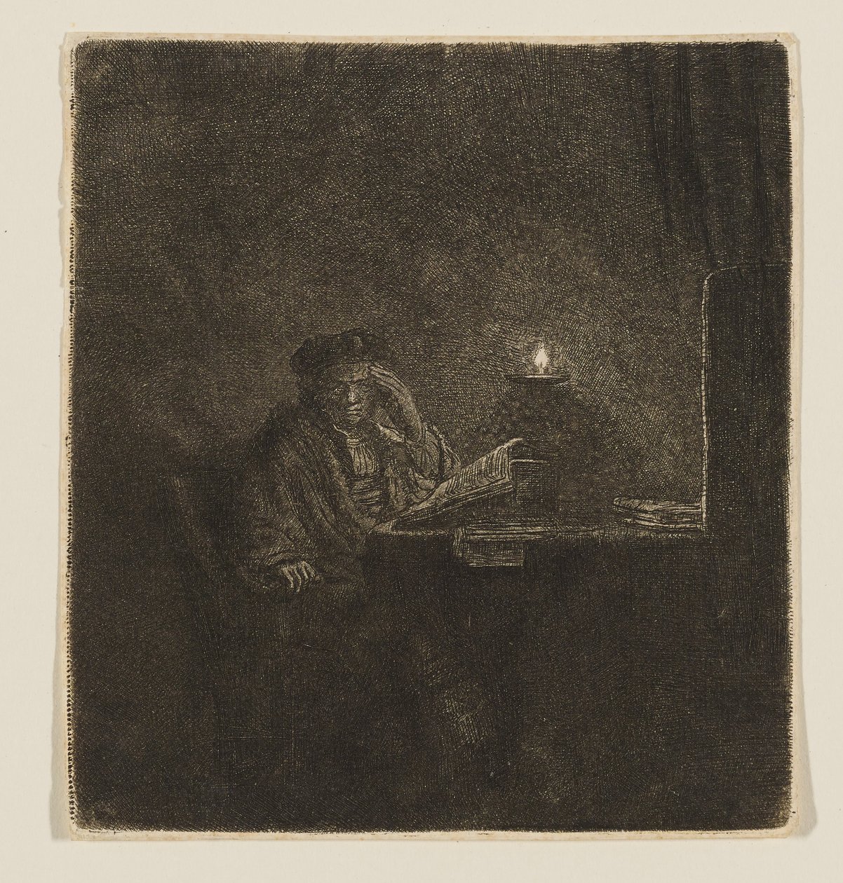 Een student aan een tafel bij kaarslicht door Rembrandt van Rijn