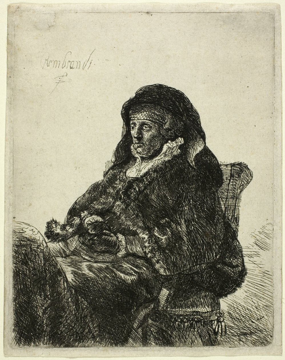 De moeder van de kunstenaar zit aan een tafel en kijkt naar rechts: Driekwart lengte door Rembrandt van Rijn