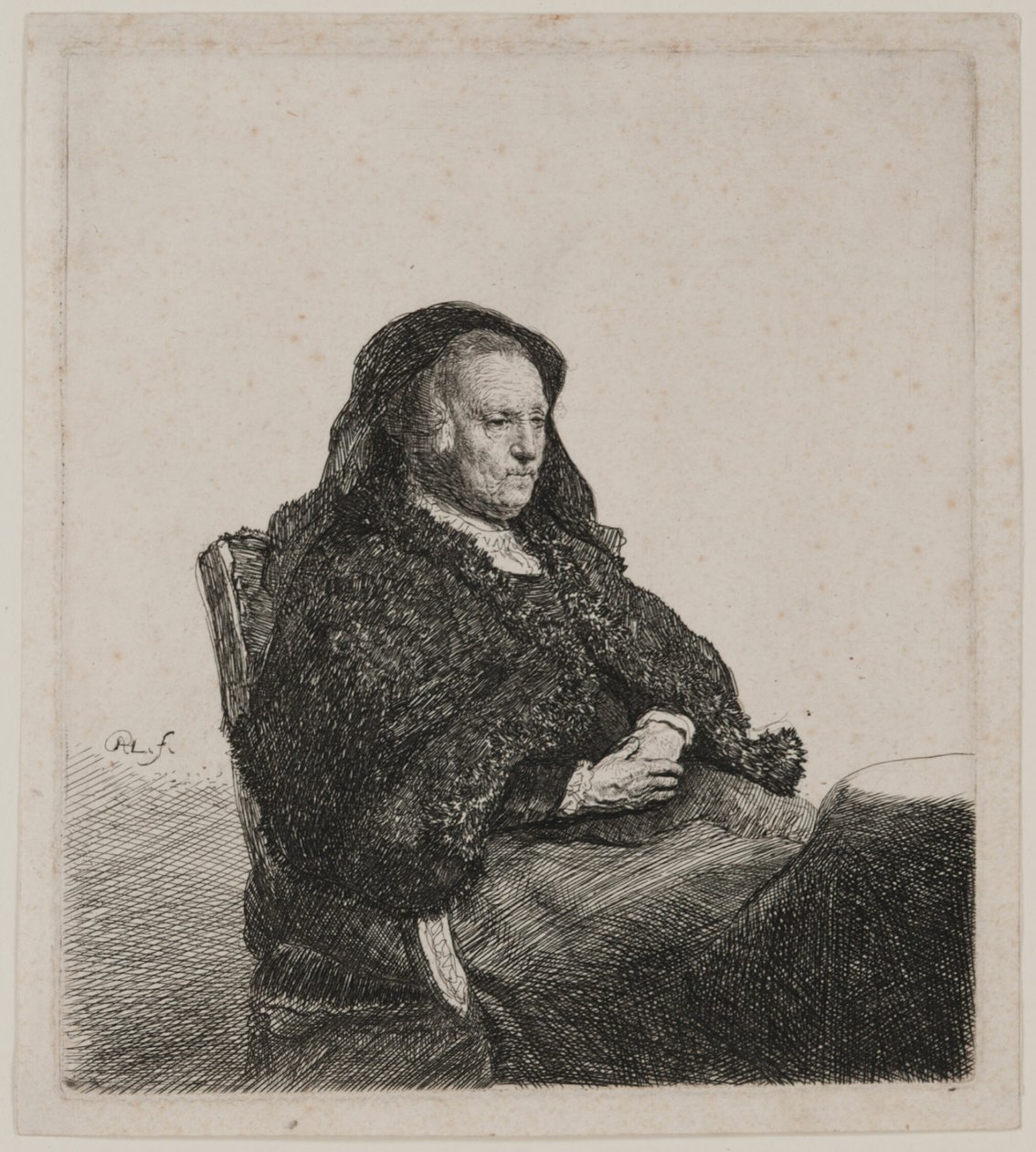 De moeder van de kunstenaar zit aan een tafel en kijkt naar rechts: Driekwart lengte door Rembrandt van Rijn