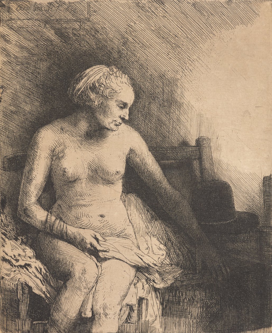 Vrouw in bad met een hoed naast haar door Rembrandt van Rijn