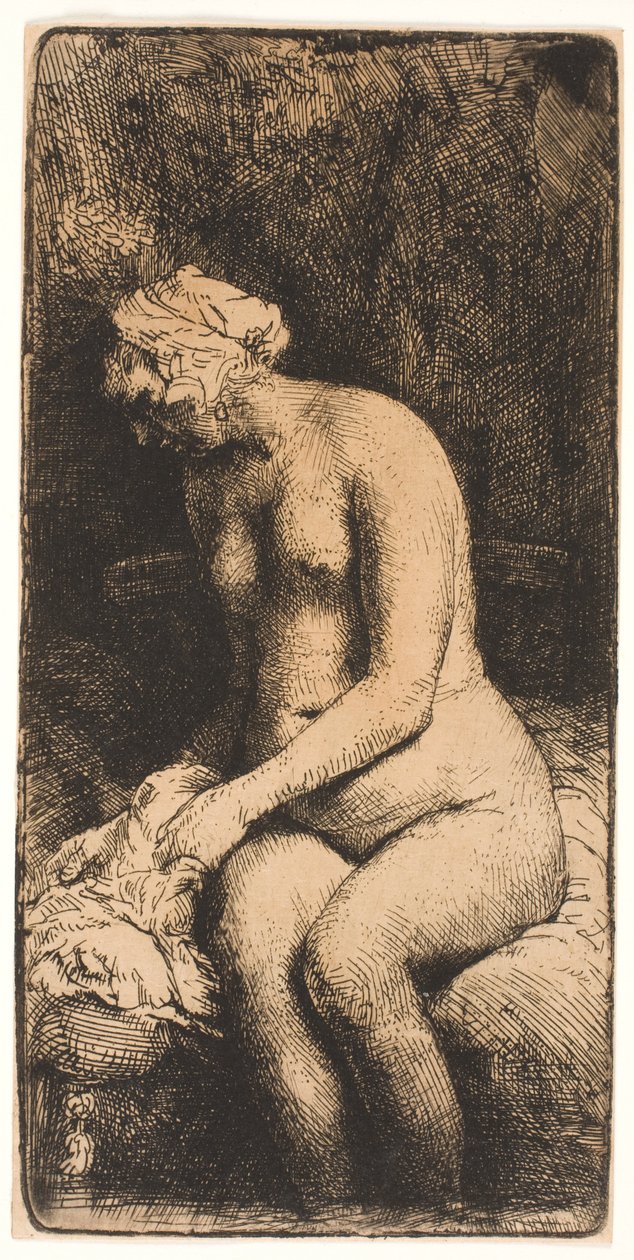 Vrouw die haar voeten baadt in een beek door Rembrandt van Rijn
