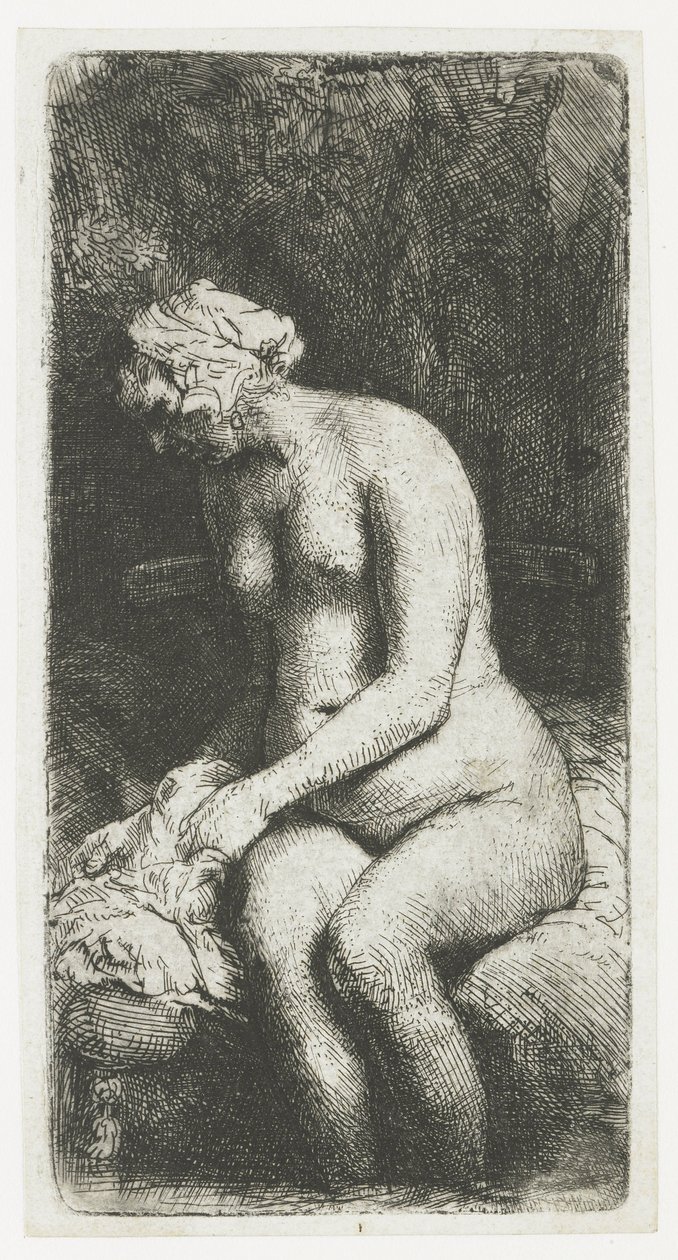 Vrouw die haar voeten baadt in een beek door Rembrandt van Rijn