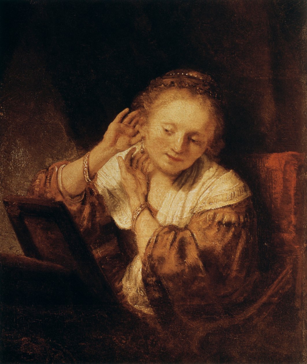 Jonge vrouw met oorbellen door Rembrandt van Rijn