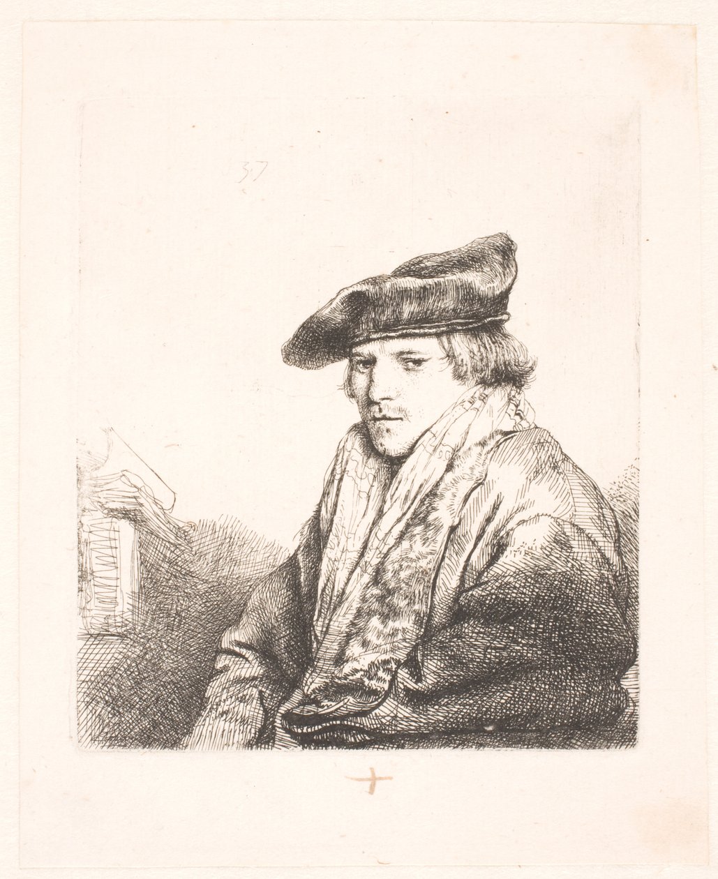 Jonge man met een fluwelen pet met boeken naast hem door Rembrandt van Rijn