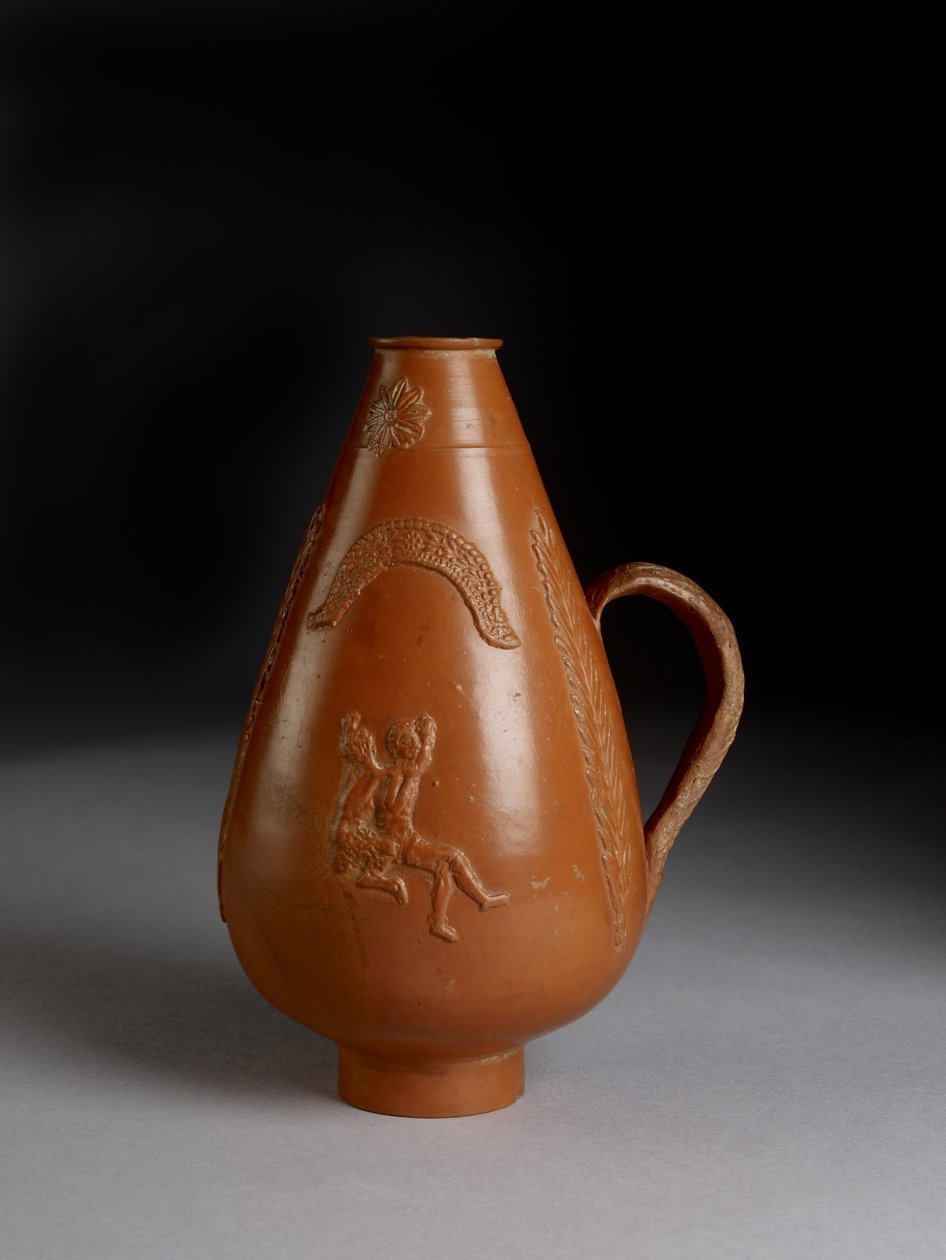 Piriforme kruik met aangebrachte decoratie van luipaard of cheeta die een veroordeelde aanvalt, dronken Pan die een maenade verkracht door Roman