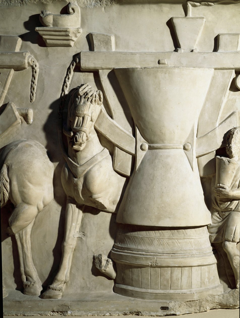 Romeinse kunst: laag reliëf dat een molenwiel toont. 1e eeuw n.Chr. Rome Museo della Civiltà Romana door Roman