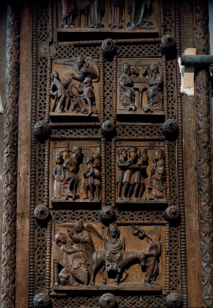 Romaans kunst: houten deur uit het midden van de 12e eeuw van de Kerk van St. Maria van het Kapitool in Keulen, Duitsland (Sankt Maria im Kapitol, Keulen). Scènes die de aankondiging aan de herders, de geboorte, de aanbidding van de wijzen en de door Romanesque