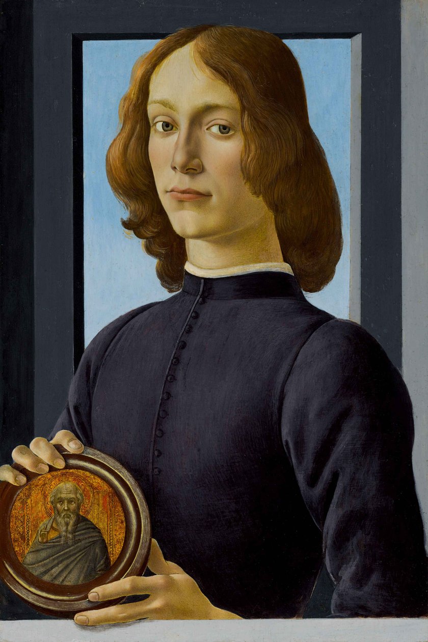 Portret van een jonge man met een medaillon door Sandro Botticelli