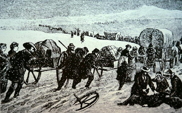 Mormoonse wagenkaravaan in een sneeuwstorm op weg naar Salt Lake City, Utah door School American