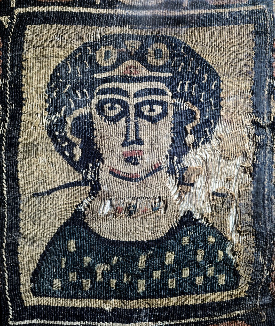Koptische stof met een portret van een vrouw door Leopold Blonder