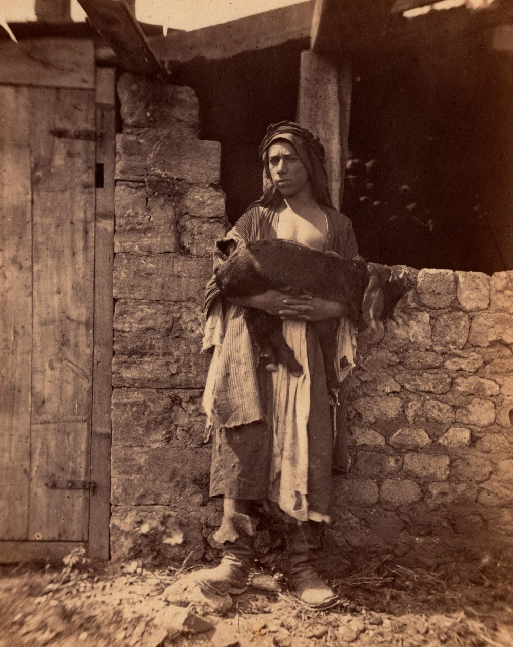 Patre van Libanon met een kind. Fotografie door Charles Lallemand (1826-1904) in "Syria, costumes, voyages and landscapes". 1865. door Unbekannter Künstler