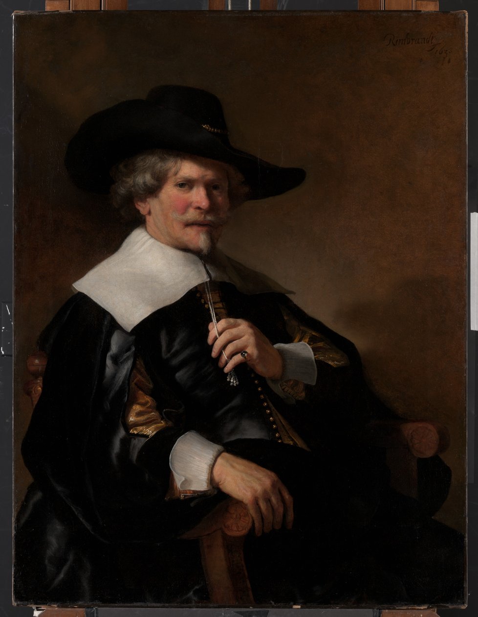 Portret van een man zittend in een leunstoel door Unknown