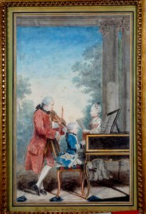 Wolfgang Amadeus Mozart (1756-1791) als kind piano spelend met zijn vader en zus door Carmontelle