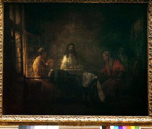 De pelgrims van Emmaus. Christus verschijnt aan de pelgrims zittend aan een tafel in een herberg in Emmaus. Schilderij van de werkplaats van Harmensz van Rijn genaamd Rembrandt (1606-1669)