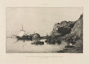 Vissersboot die aanlegt bij de rotsen van Collioure