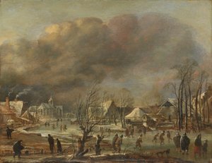Sneeuwval op een dorp naast een bevroren kanaal