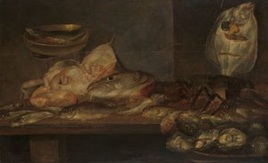Stilleven met vis en een kreeft en oesters op een tafel in de buurt