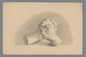 Gipsmodel van twee gevouwen handen