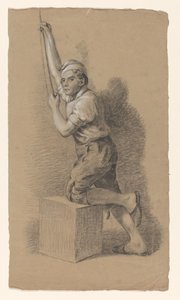 Man knielend op een blok, naar links, een touw trekkend