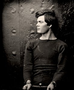 Lewis Powell in polsboeien aan boord van de USS Saugus, 1865