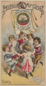 Kinderen dansen rond banier