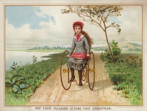 Meisje rijdt op een driewieler op het platteland