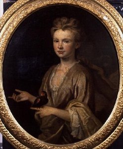 Portret van een jong meisje met een papegaai