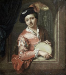 Een jonge jongen met een tamboerijn