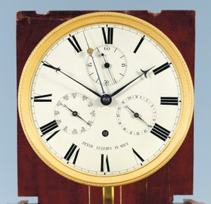 Een maandlopende bodenstanduhr met tijdsvergelijking en volledige kalender