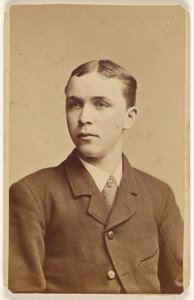 [Ongeïdentificeerde man in 3/4 profiel, zittend].