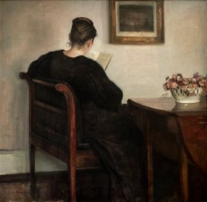 Interieur, lezende vrouw