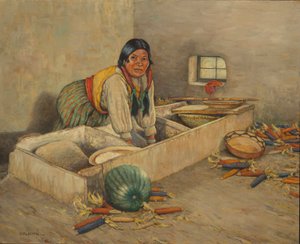 Hopi vrouw maalt maïs