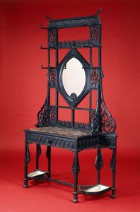 Een Coalbrookdale gietijzeren halstandaard
